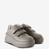 Grey sneakers, side view