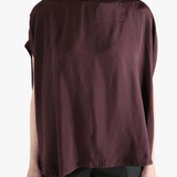 Burgundy top worn by a person, showing the top's fit