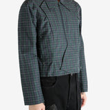 Green blouson worn by a person, showing the blouson's fit