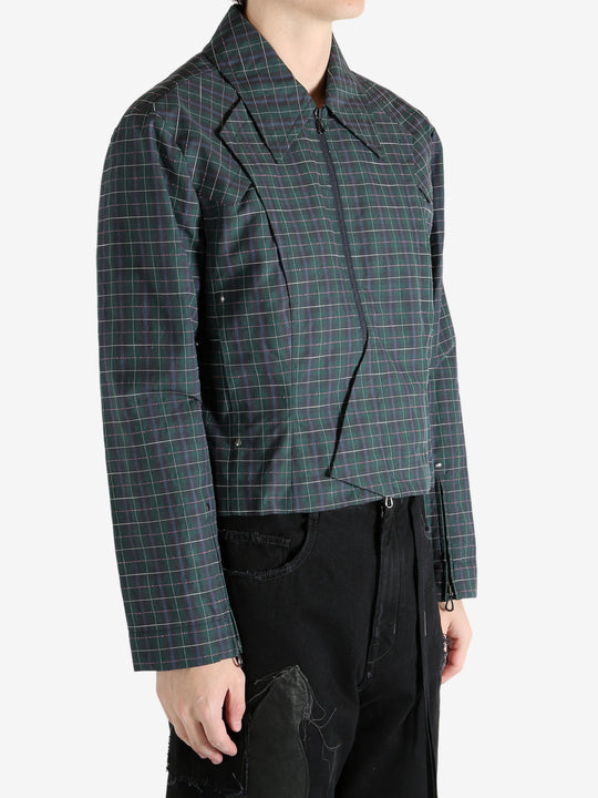 Green blouson worn by a person, showing the blouson's fit