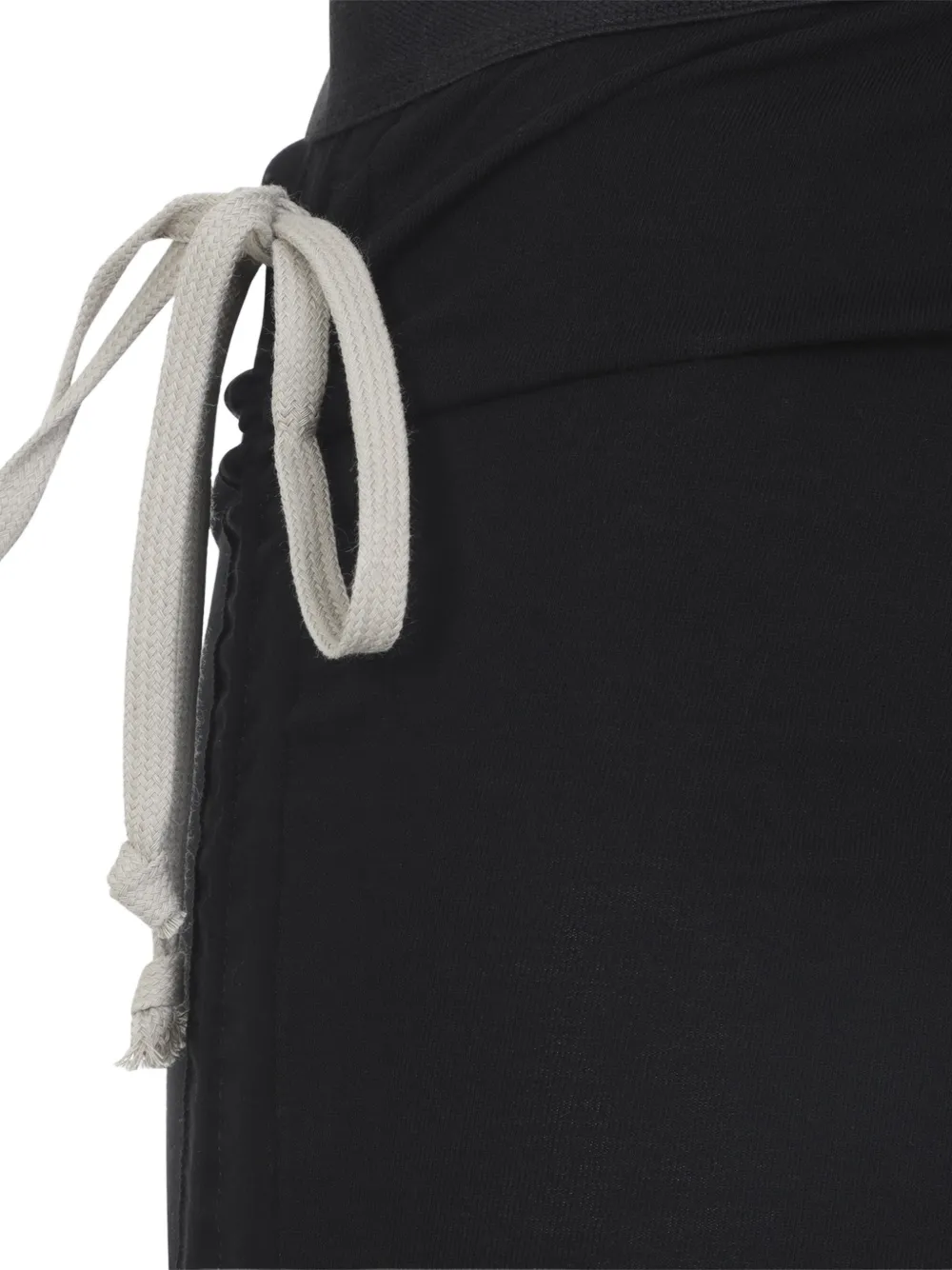 Close up of black skirt, showing texture of the cotton fabric