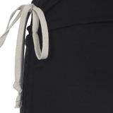 Close up of black skirt, showing texture of the cotton fabric