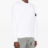 White sweatshirt worn by a person, showing the sweatshirt fit