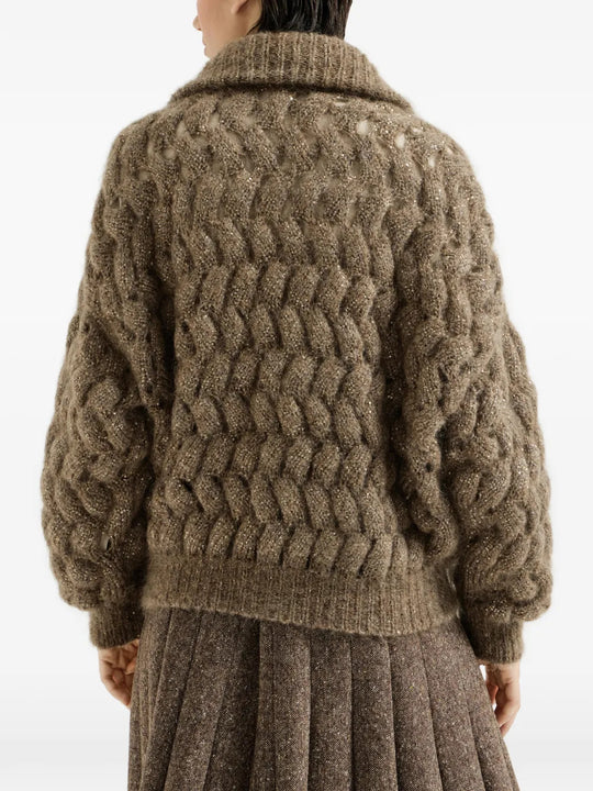 Brown knitwear worn by a person, showing the knitwear fit