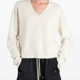 White top, full body view