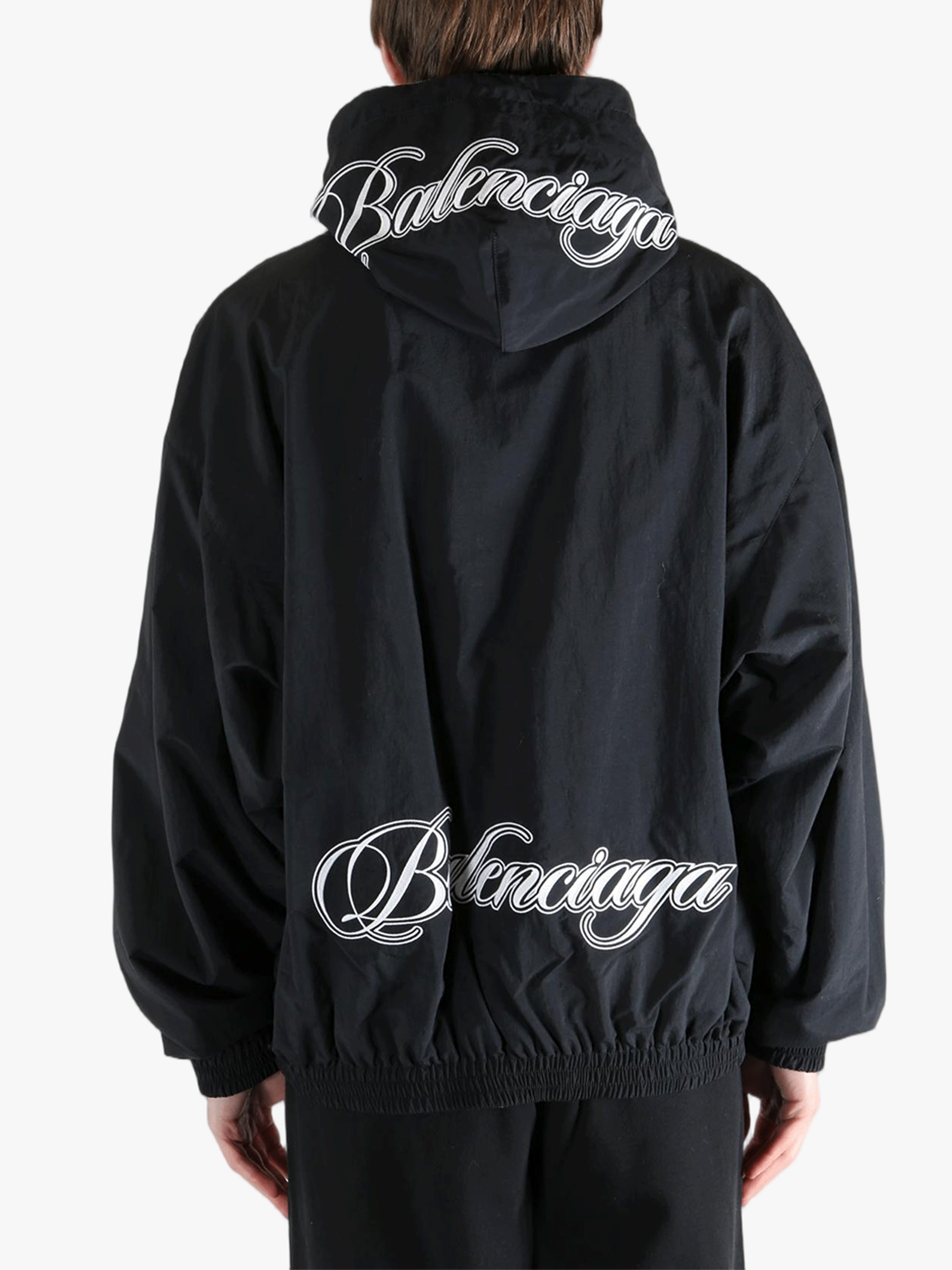 Black jacket worn by a person, showing the jacket's fit