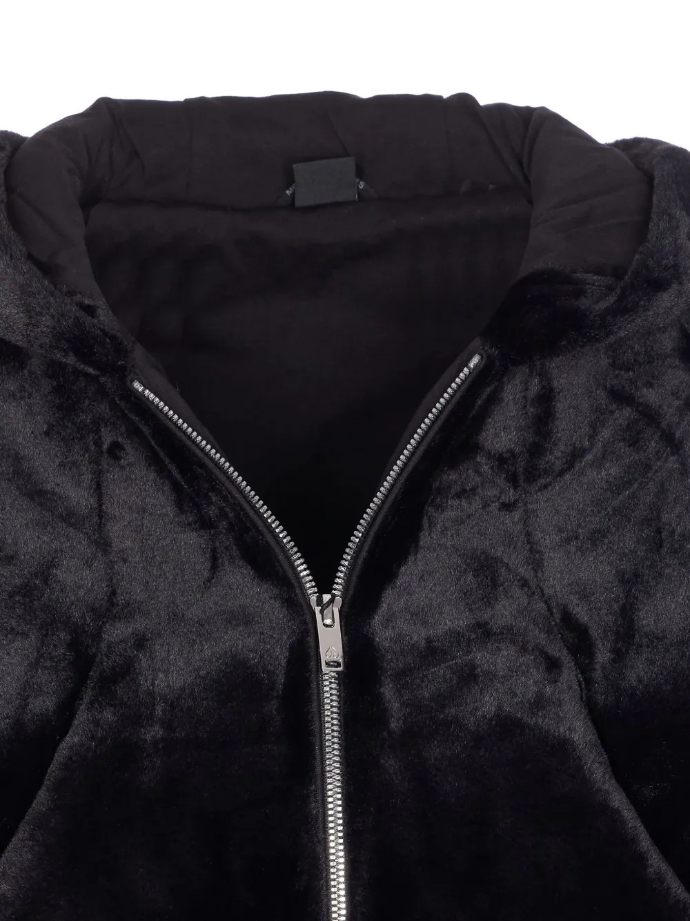 Close up of Black coat, showing texture of the cotton fabric