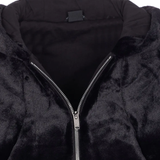 Close up of Black coat, showing texture of the cotton fabric