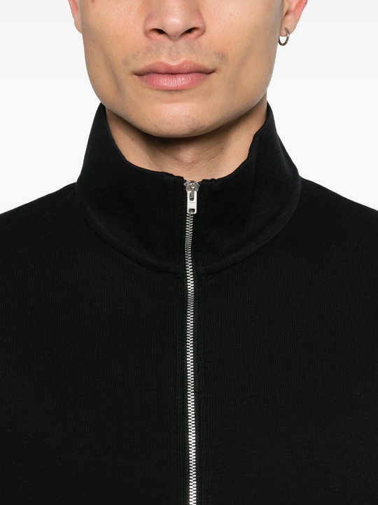 Close up of black sweat, showing texture of the Cotton fabric