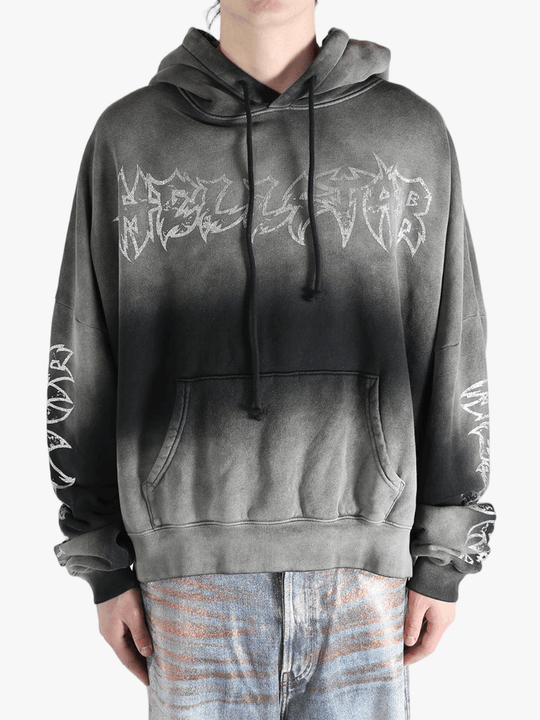 Gray hoodie worn by a person, showing the hoodie fit