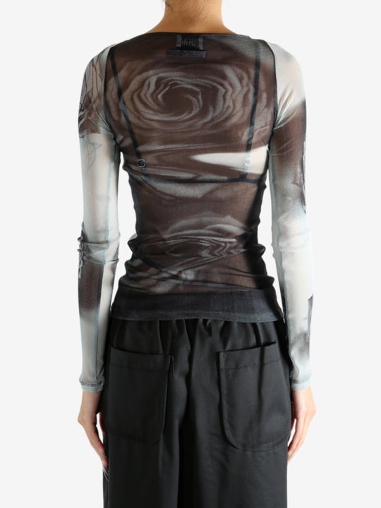 Grey top worn by a person, showing the top's fit