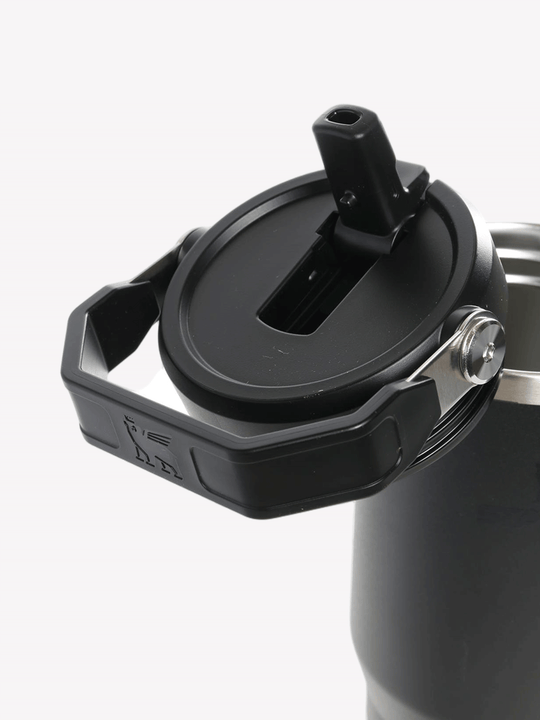 Close up of balck tumbler, showing texture of the steel fabric