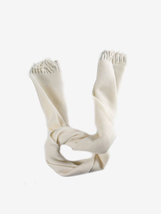 Close up of white scarves, showing texture of the recycled wool and wool fabric