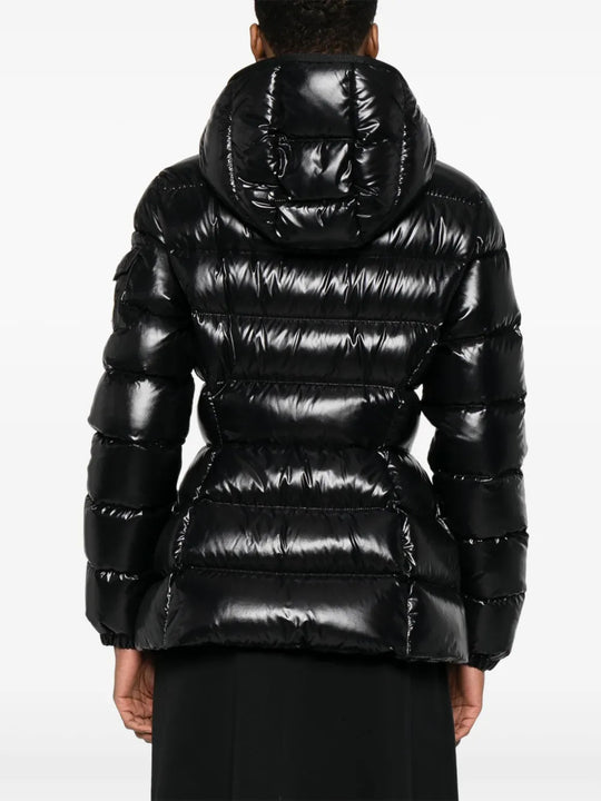 Black jacket worn by a person, showing the jacket fit