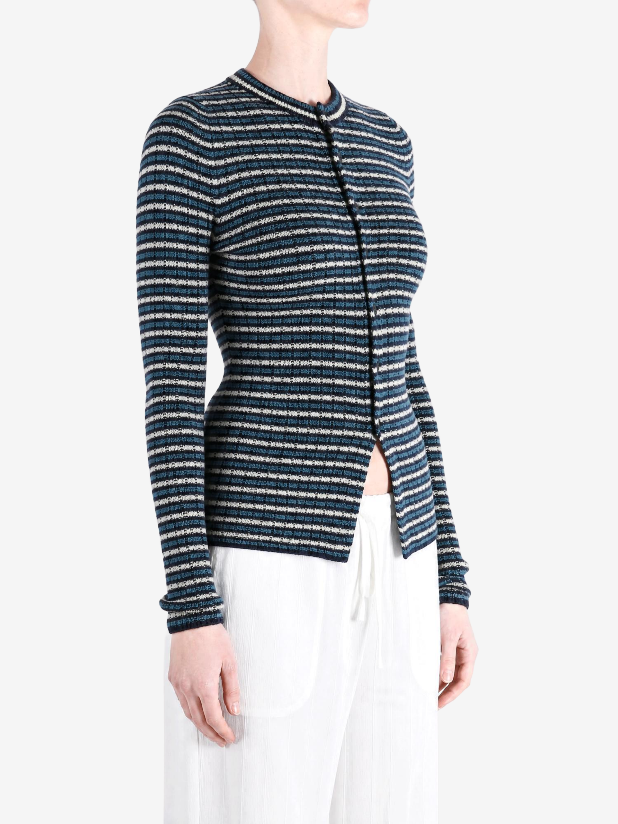 Navy knitwear worn by a person, showing the knitwear fit