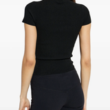 black top worn by a person, showing the top's fit