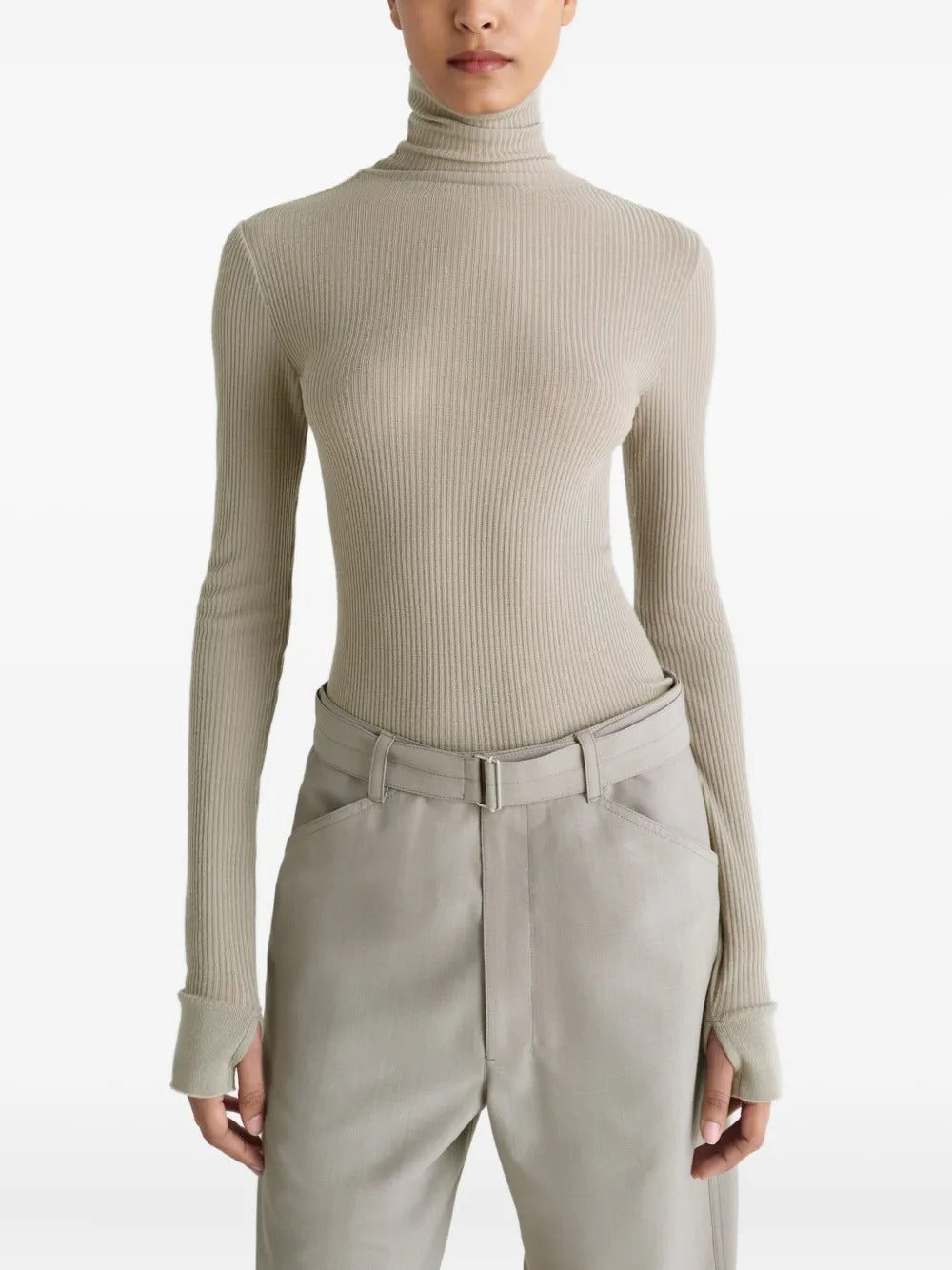 Tan top worn by a person, showing the top's fit
