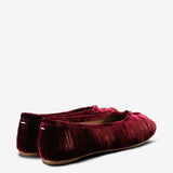 Red shoes, back view