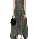 Green dress  worn by a person, showing the dress's fit