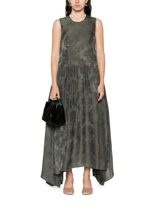 Green dress  worn by a person, showing the dress's fit