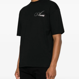  black t-shirt warn a person,showing the t-shirts fit