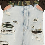 Blue jeans worn by a person, showing the jeans fit