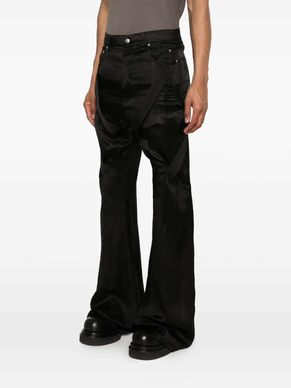 Black pant worn by a person, showing the pant fit