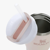 Close up of pink tumbler, showing texture of the stainless steel fabric