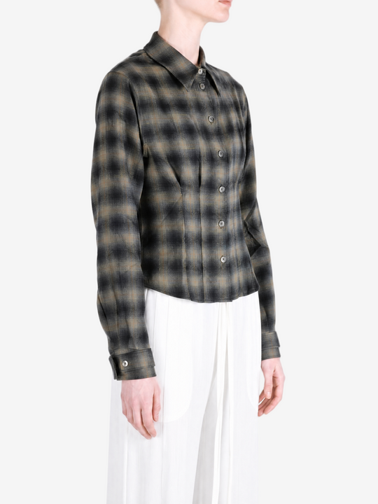 Brown shirt worn by a person, showing the shirt fit