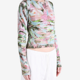 Pink top worn by a person, showing the top fit
