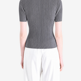 Grey shirt worn by a person, showing the shirt fit