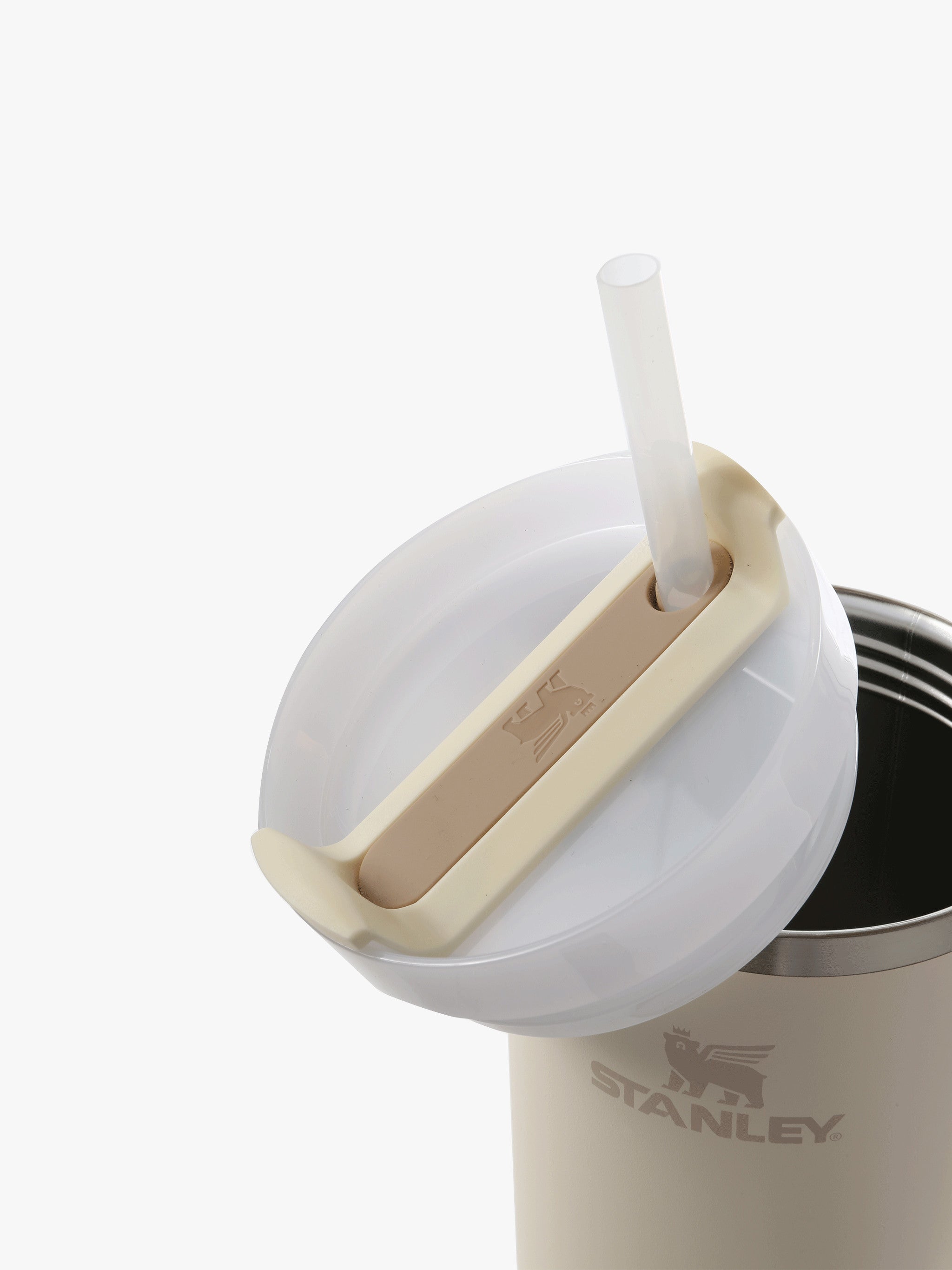 Close up of the tan bottle, showing texture of the stainless steel fabric