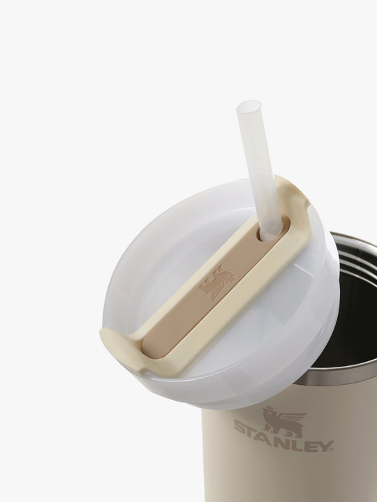 Close up of the tan bottle, showing texture of the stainless steel fabric