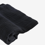 Close up of Black scarf, showing texture of the 70% cashmere/ 30% silk fabric