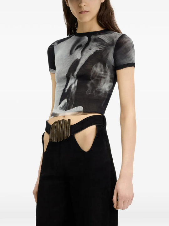 Black t-shirt worn by a person, showing the t-shirt fit