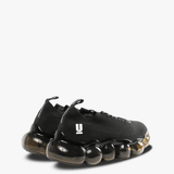 Black sneaker , back view
