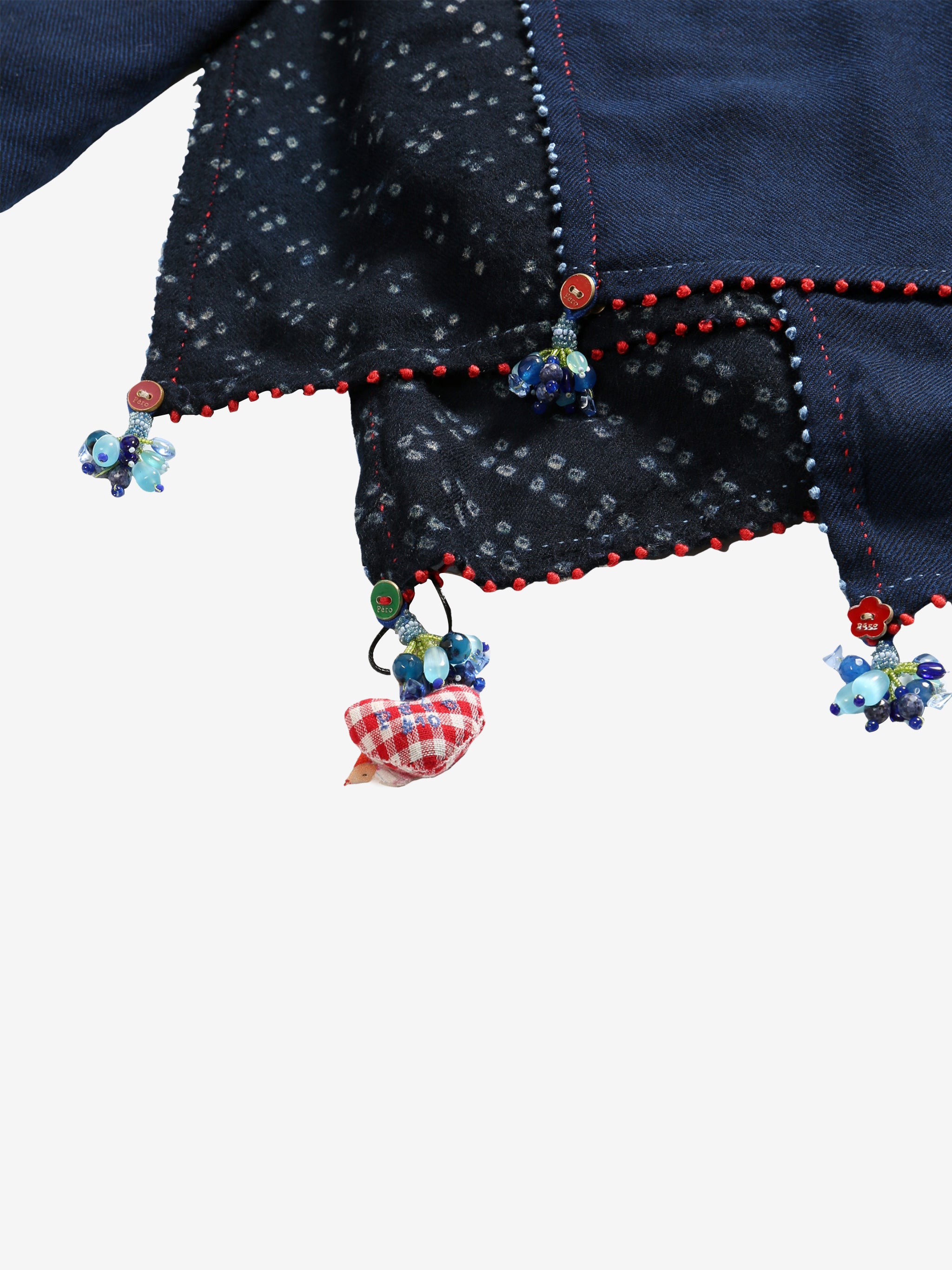 Close up of the navy scarf, showing texture of the wool fabric