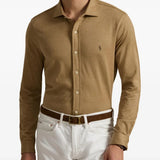 Brown shirt worn by a person, showing the shirt's fit