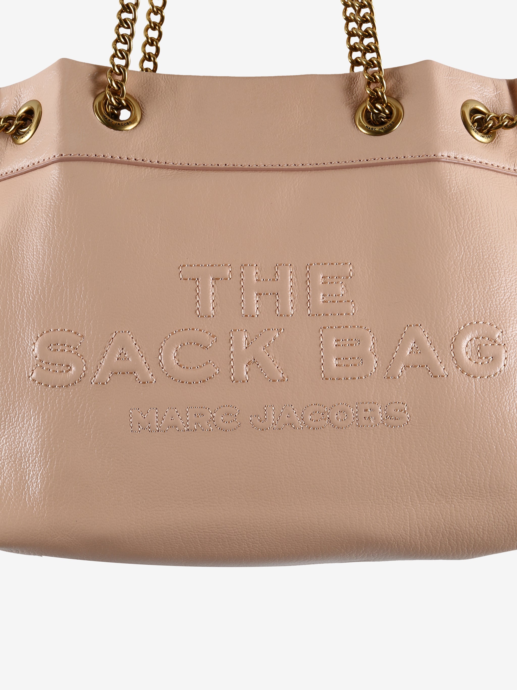 Close up of pink bag, showing texture of the leather fabric