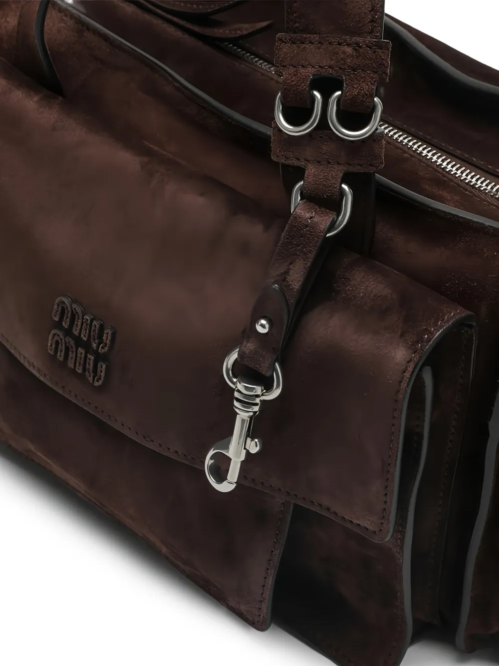 Close up of Brown bags, showing texture of the calf suede fabric