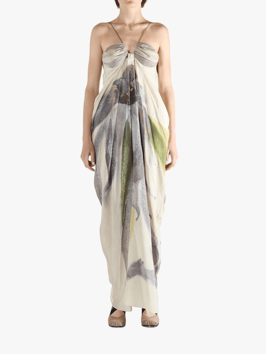 Tan dresses worn by a person, showing the dresses' fit