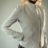 Close up of grey jacket, showing texture of the fabric