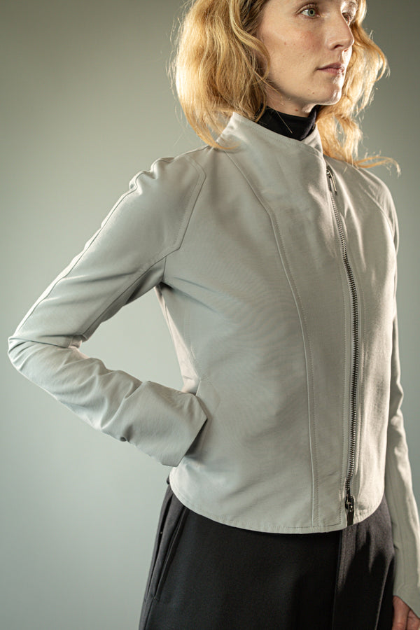 Close up of grey jacket, showing texture of the fabric