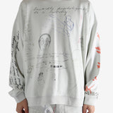 Grey top worn by a person, showing the top fit