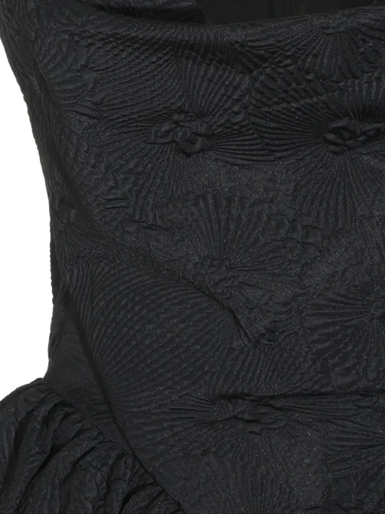 Close up of Black dress, showing texture of the 89% polyester/ 11% polyamide fabric