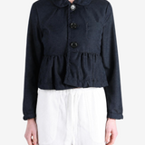 Navy jacket worn by a person, showing the jacket fit