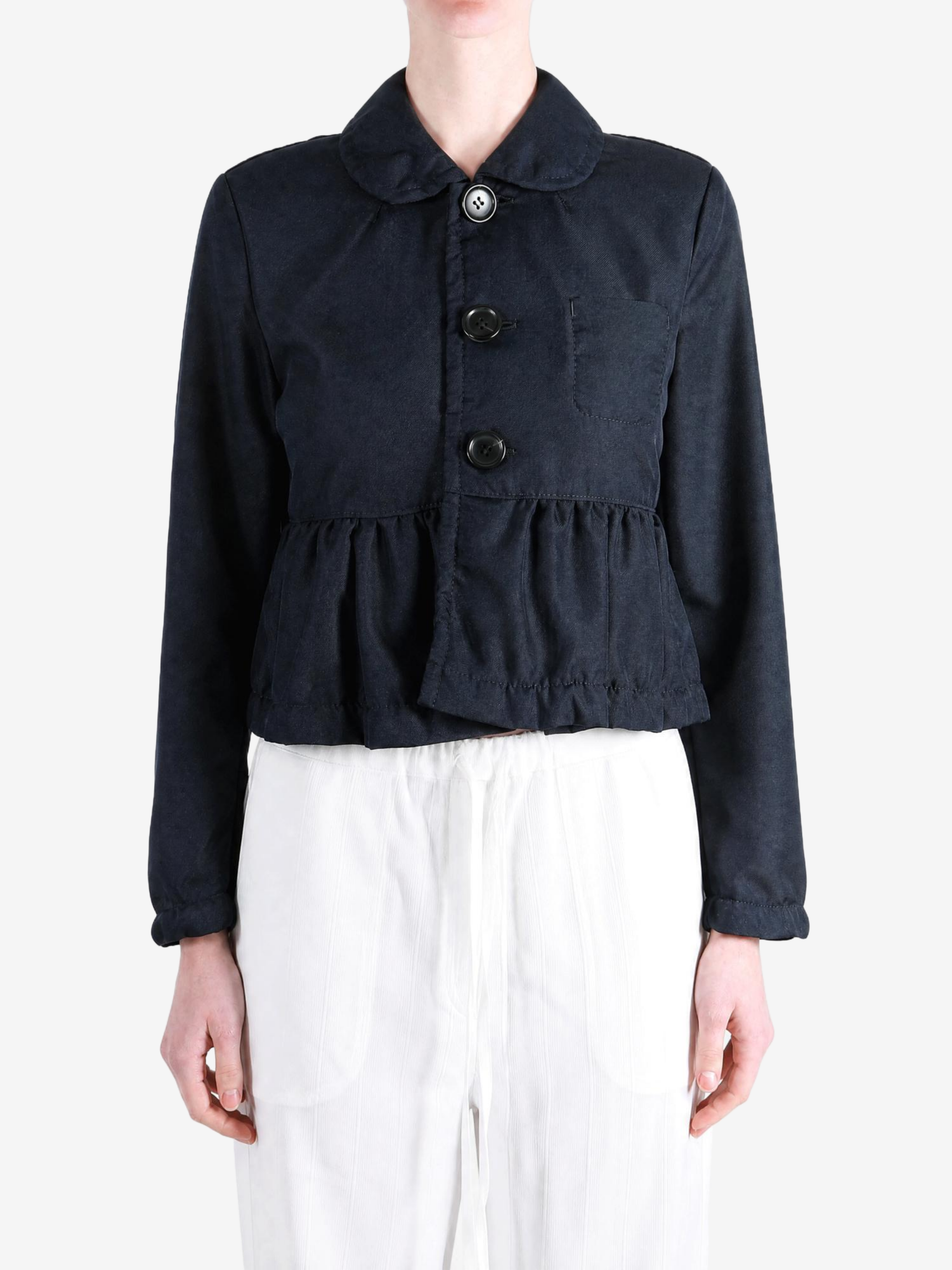 Navy jacket worn by a person, showing the jacket fit
