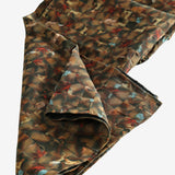 Close up of brown scarf, showing texture of the fabric