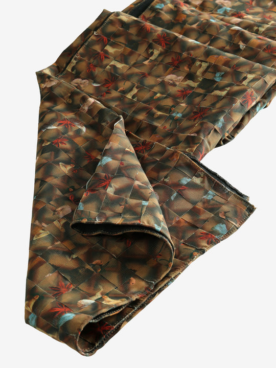 Close up of brown scarf, showing texture of the fabric