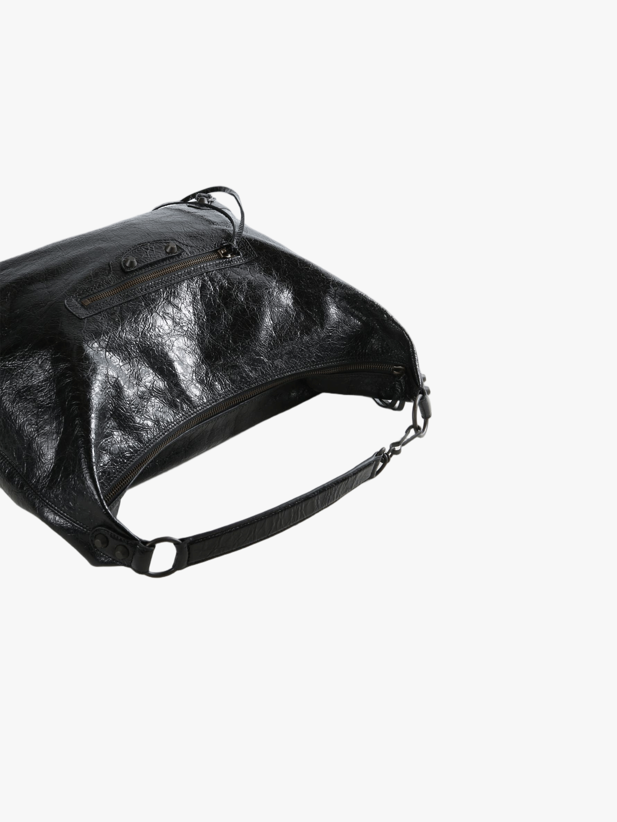 Close up of black handbag,showing texture of the lambskin fabric